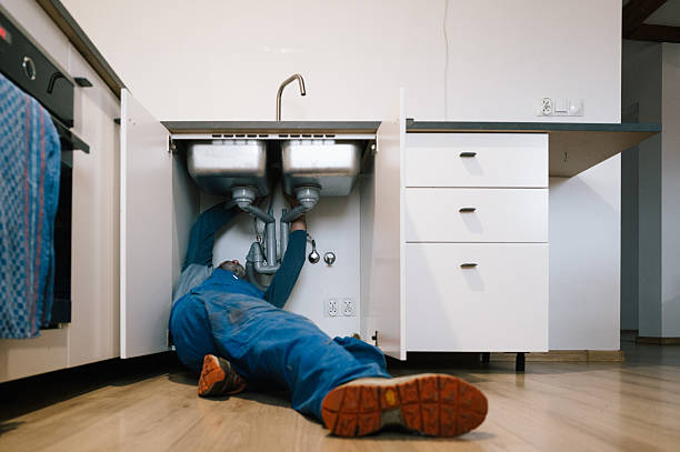 Professional Emergency Plumber technician working in Elliottville, KY